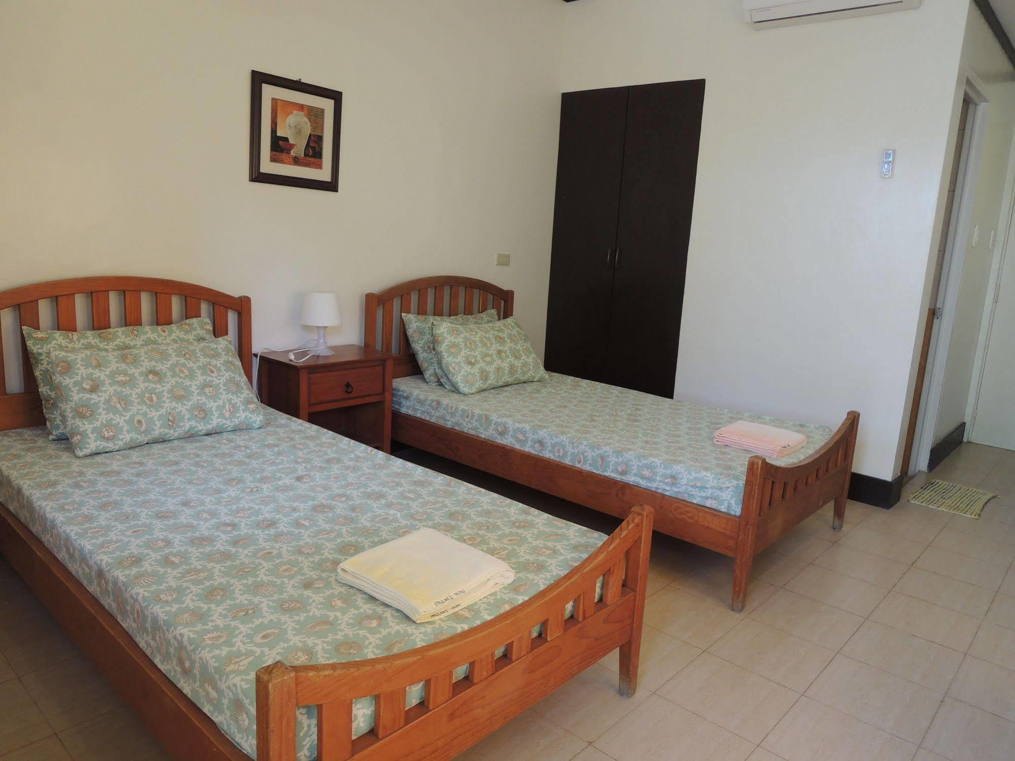 Palms Seaside Inn And Resort Medellin Ngoại thất bức ảnh
