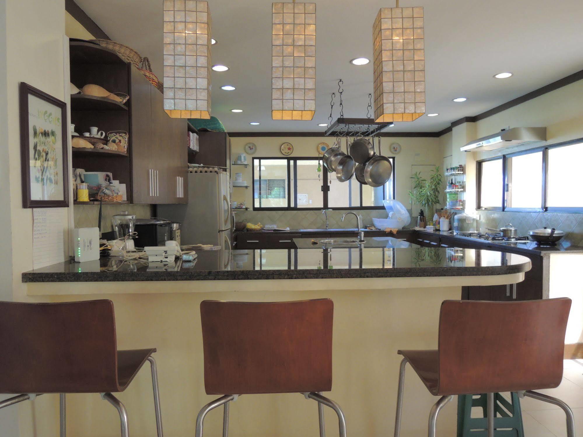Palms Seaside Inn And Resort Medellin Ngoại thất bức ảnh